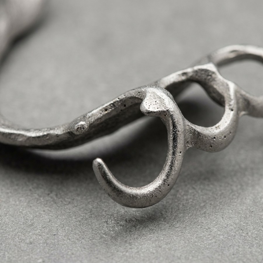 Cast cobalt-chrome partial denture framework with a clasp arm